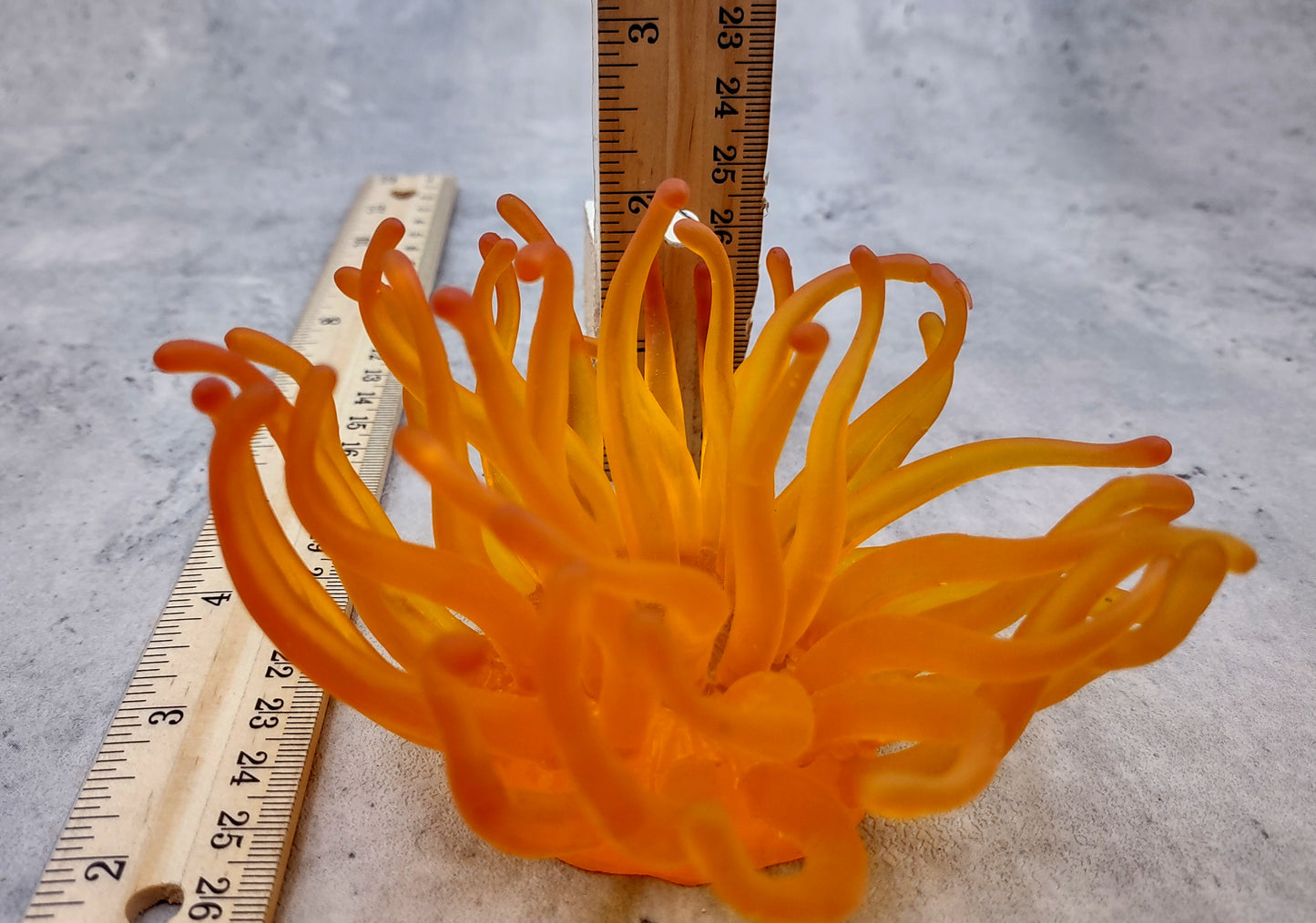 Condylactis Yellow FAUX Anemone - Condylactis Gigantea - (1 FAUX Anemone approx. 5x2.75x5 inches). Orange and yellow fake anemone with purple tipped tentacles. Copyright 2024 SeaShellSupply.com.