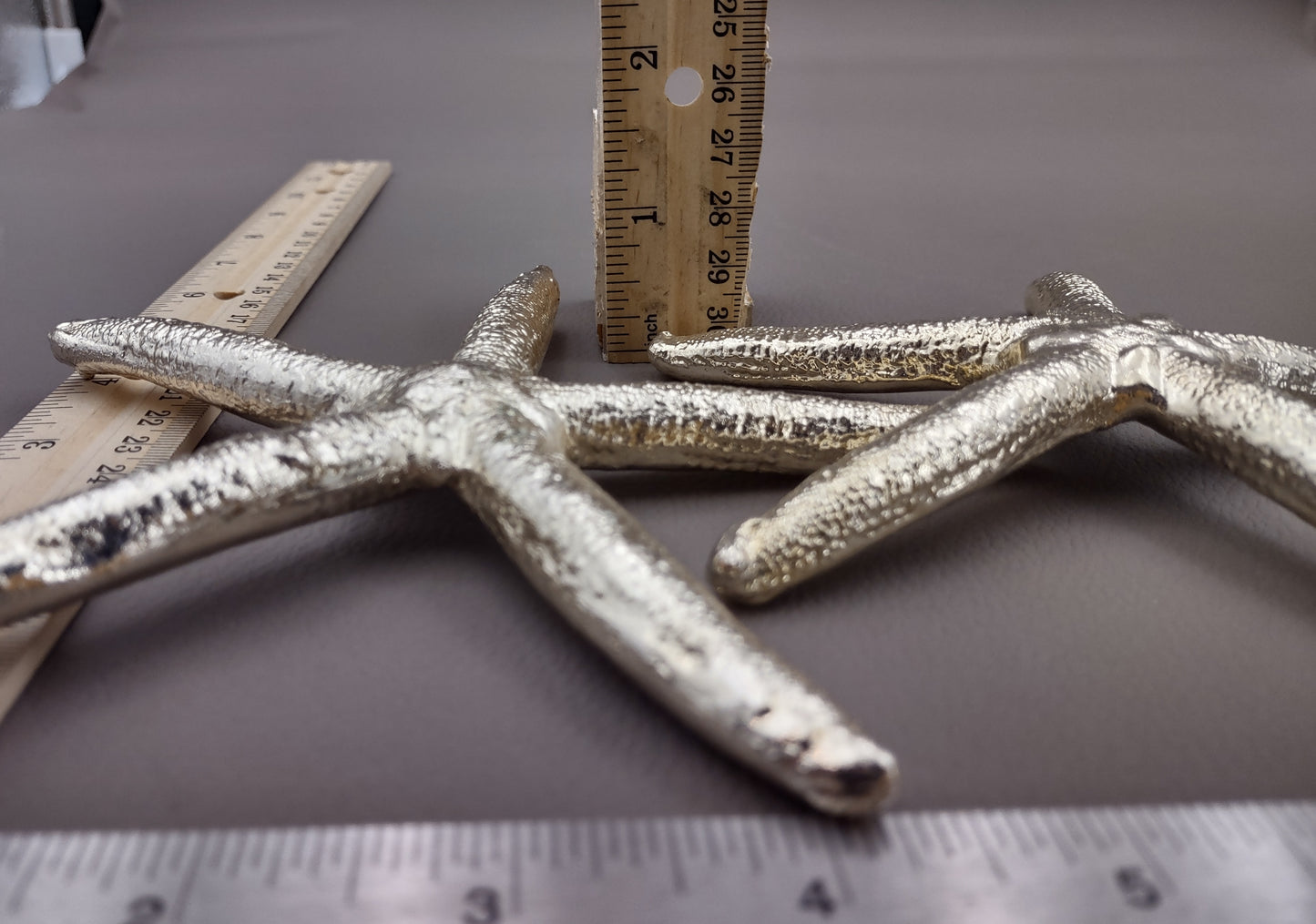 Silver Plated Real Linckia Starfish - (1 Seastar approx. 5+ inches) One silver plated star fish. Copyright 2024 SeaShellSupply.com