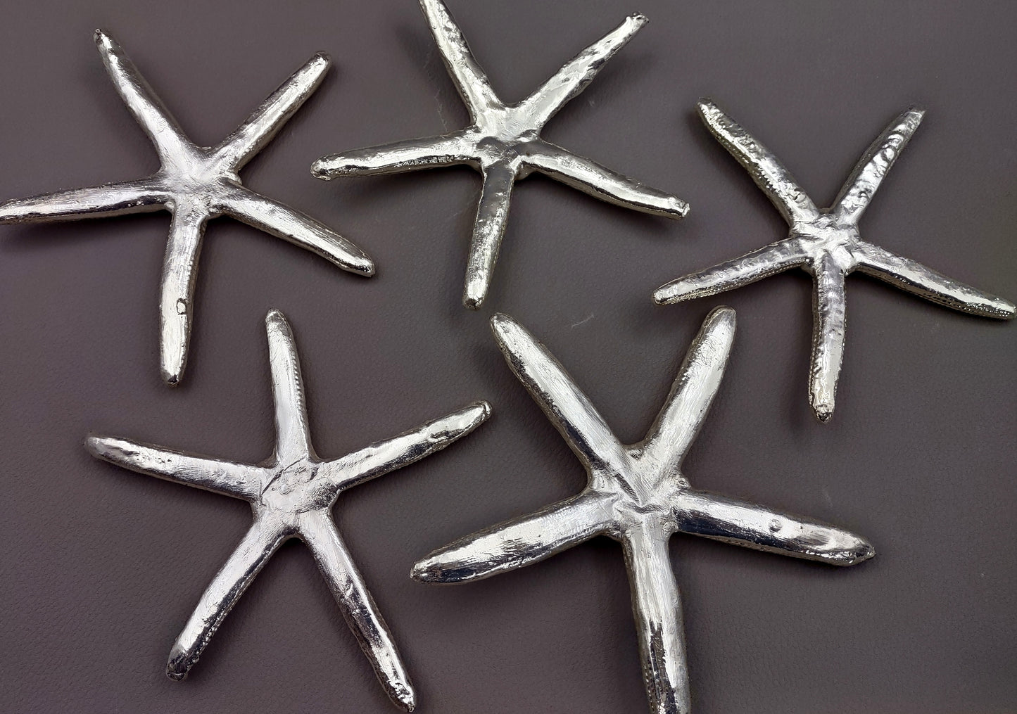 Silver Plated Real Linckia Starfish - (1 Seastar approx. 5+ inches) One silver plated star fish. Copyright 2024 SeaShellSupply.com