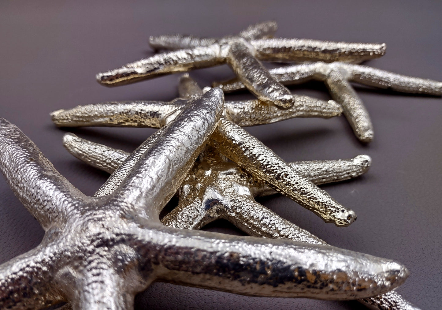 Silver Plated Real Linckia Starfish - (1 Seastar approx. 5+ inches) One silver plated star fish. Copyright 2024 SeaShellSupply.com