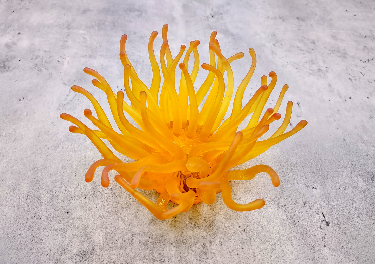 Condylactis Yellow FAUX Anemone - Condylactis Gigantea - (1 Anemone approx. 10x9x8 inches. A orange and yellow hinted stringy shiny fake anemone. Copyright 2024 SeaShellSupply.com.