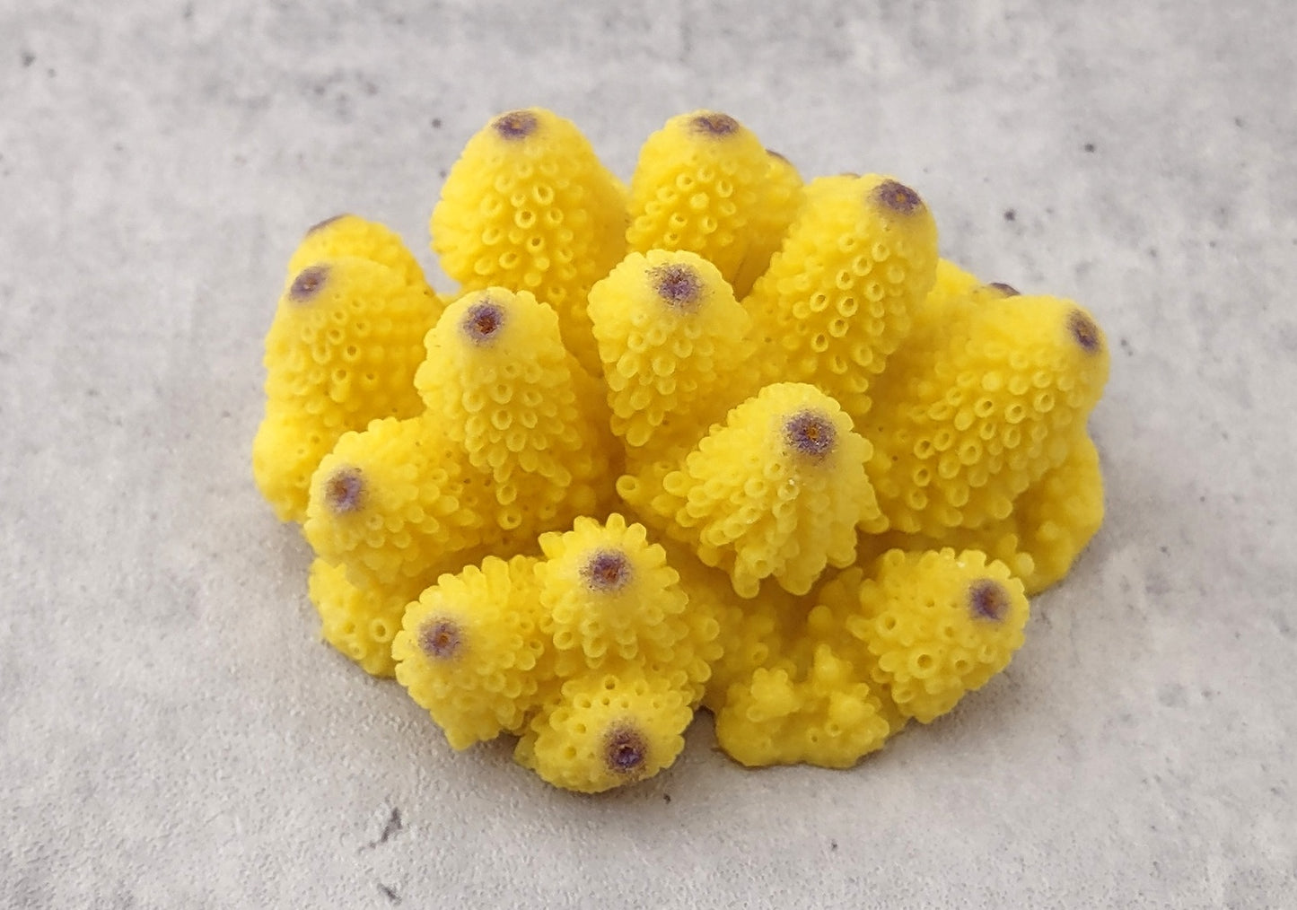 Yellow Cluster FAUX Coral - Acropora Monticulosa - (1 Fake Coral approx. 2Wx3Dx2T) on grey background. Copyright 2022 SeaShellSupply.com.