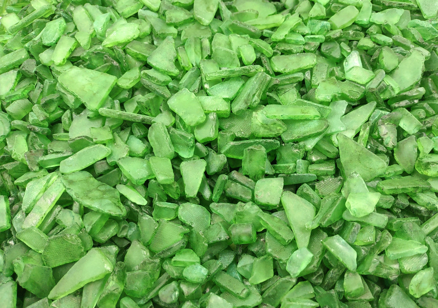 Beach Sea Glass Rough Dark Green Medium (approx. 10 pounds 0.5-1+ inches) Man made tumbled rough sea glass fragments. Copyright 2024 Seashellsupply.com