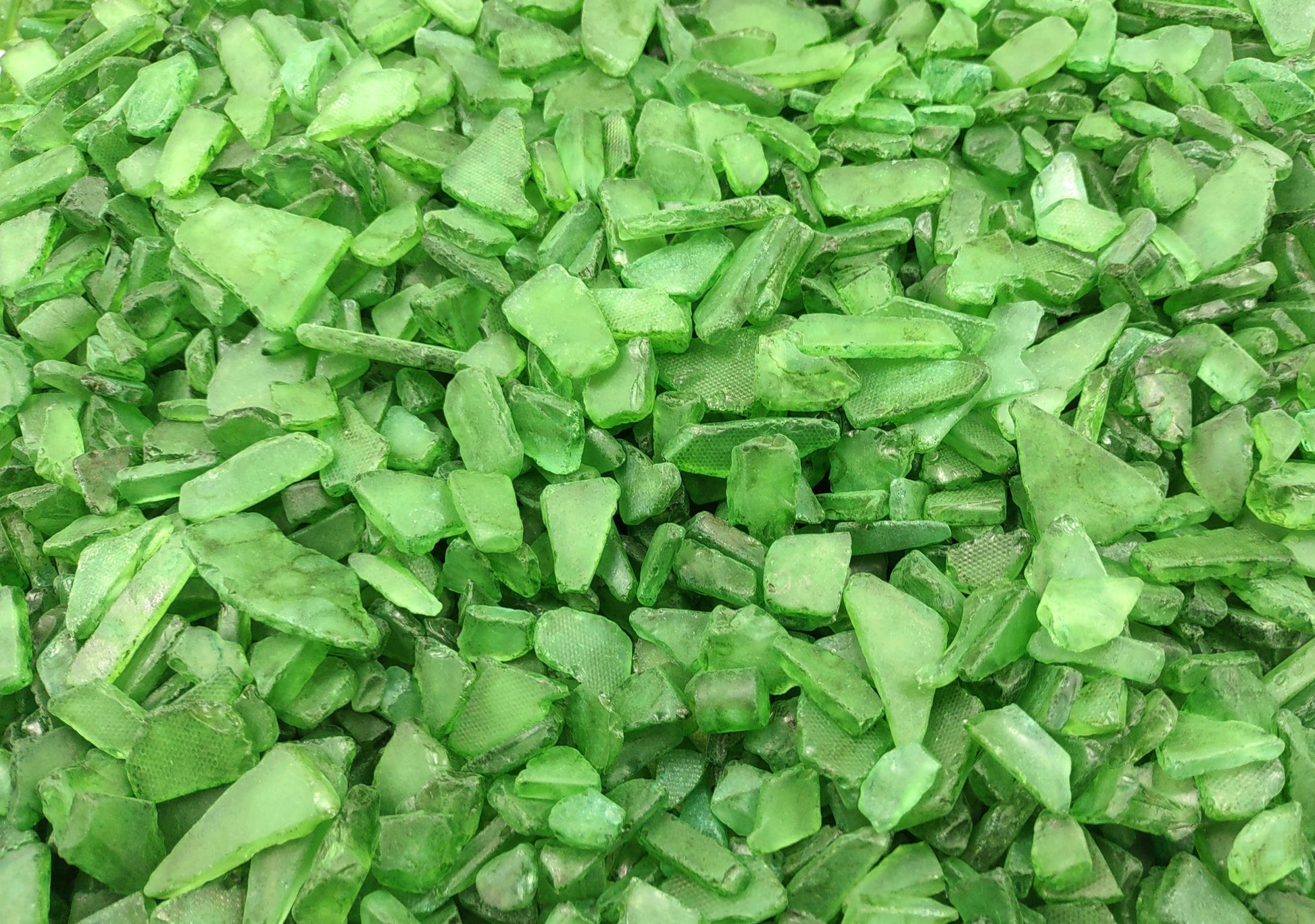 Beach Sea Glass Rough Dark Green Medium (approx. 10 pounds 0.5-1+ inches) Man made tumbled rough sea glass fragments. Copyright 2024 Seashellsupply.com