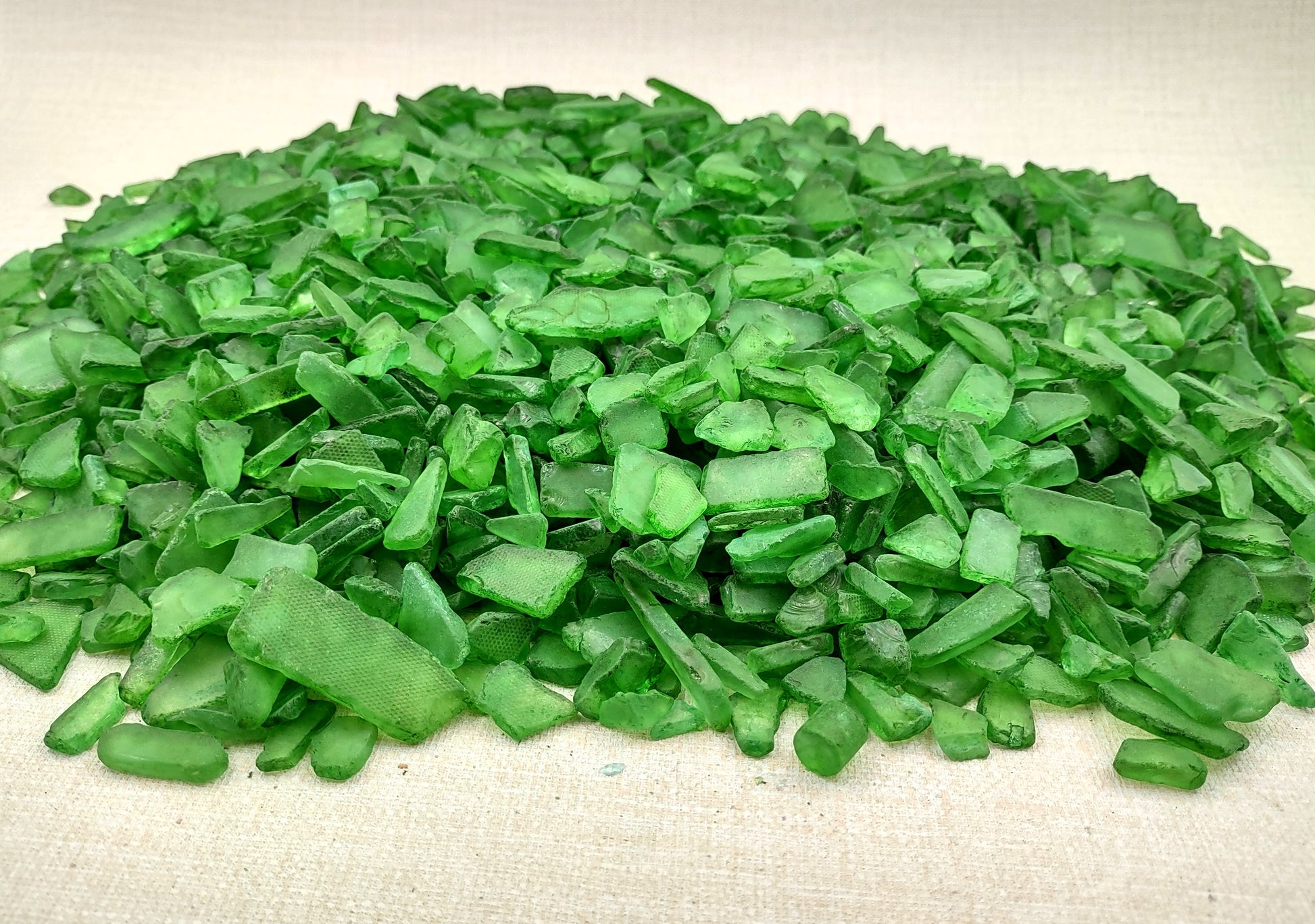 Beach Sea Glass Rough Dark Green Medium (approx. 10 pounds 0.5-1+ inches) Man made tumbled rough sea glass fragments. Copyright 2024 Seashellsupply.com