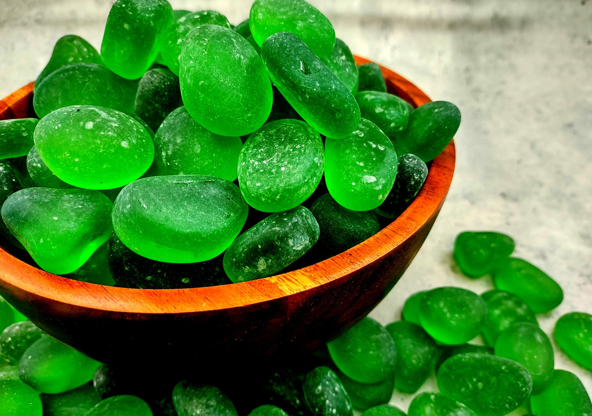 Beach Sea Glass Rounded Green Frosted Tumbled Pebbles (approx. 10 lbs. 1-1.5 inch). Green Beach Glass pebbles. Copyright 2022 SeaShellSupply.com.