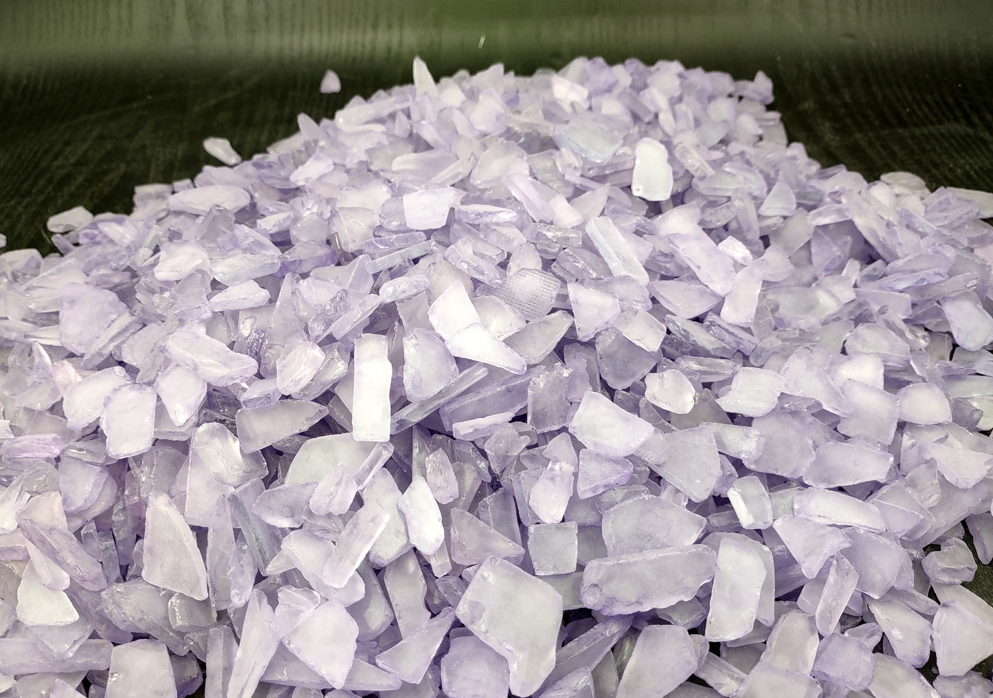 Beach Sea Glass Rough Lavender Medium (approx. 10 pounds 0.5-1+ inches) Man made tumbled rough sea glass fragments. Copyright 2024 Seashellsupply.com