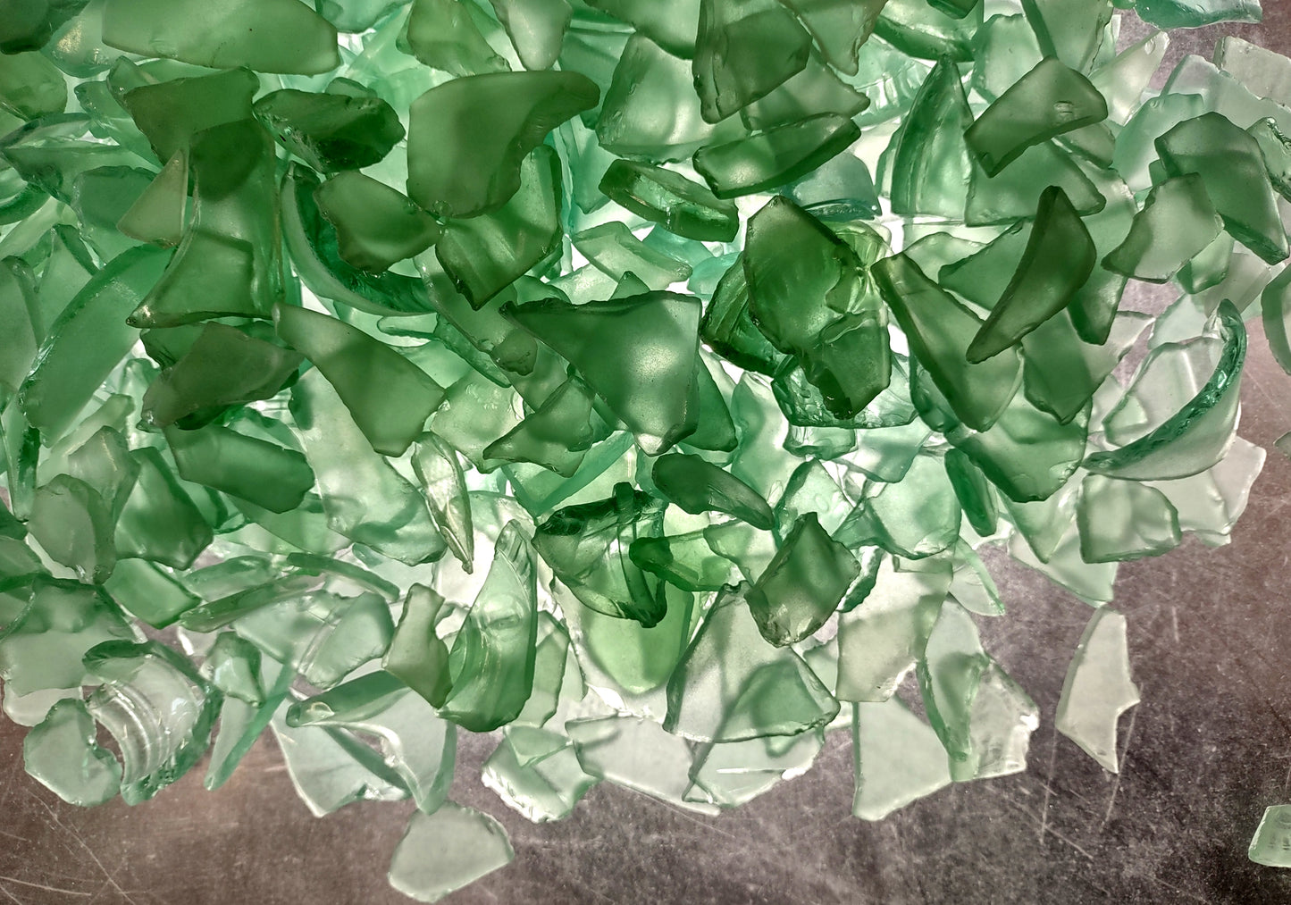 Beach Glass - Medium Tumbled Rough Coke Bottle Green - (approx. 1 Kilogram/2.2 lbs. .5-1.25 inches). Multiple green glass pieces in different shapes. Copyright 2024 SeaShellSupply.com.