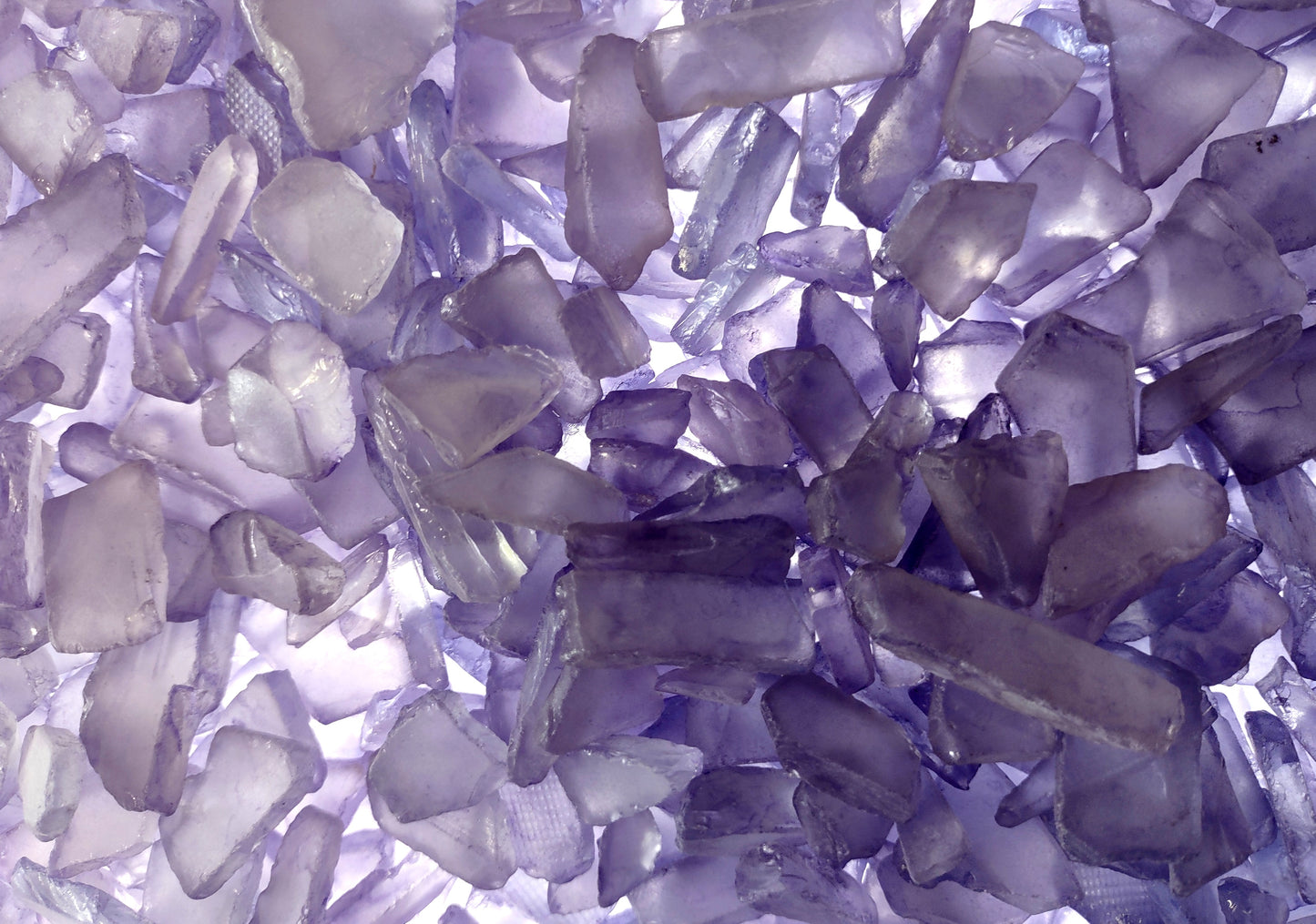 Beach Sea Glass Rough Lavender Medium (approx. 10 pounds 0.5-1+ inches) Man made tumbled rough sea glass fragments. Copyright 2024 Seashellsupply.com