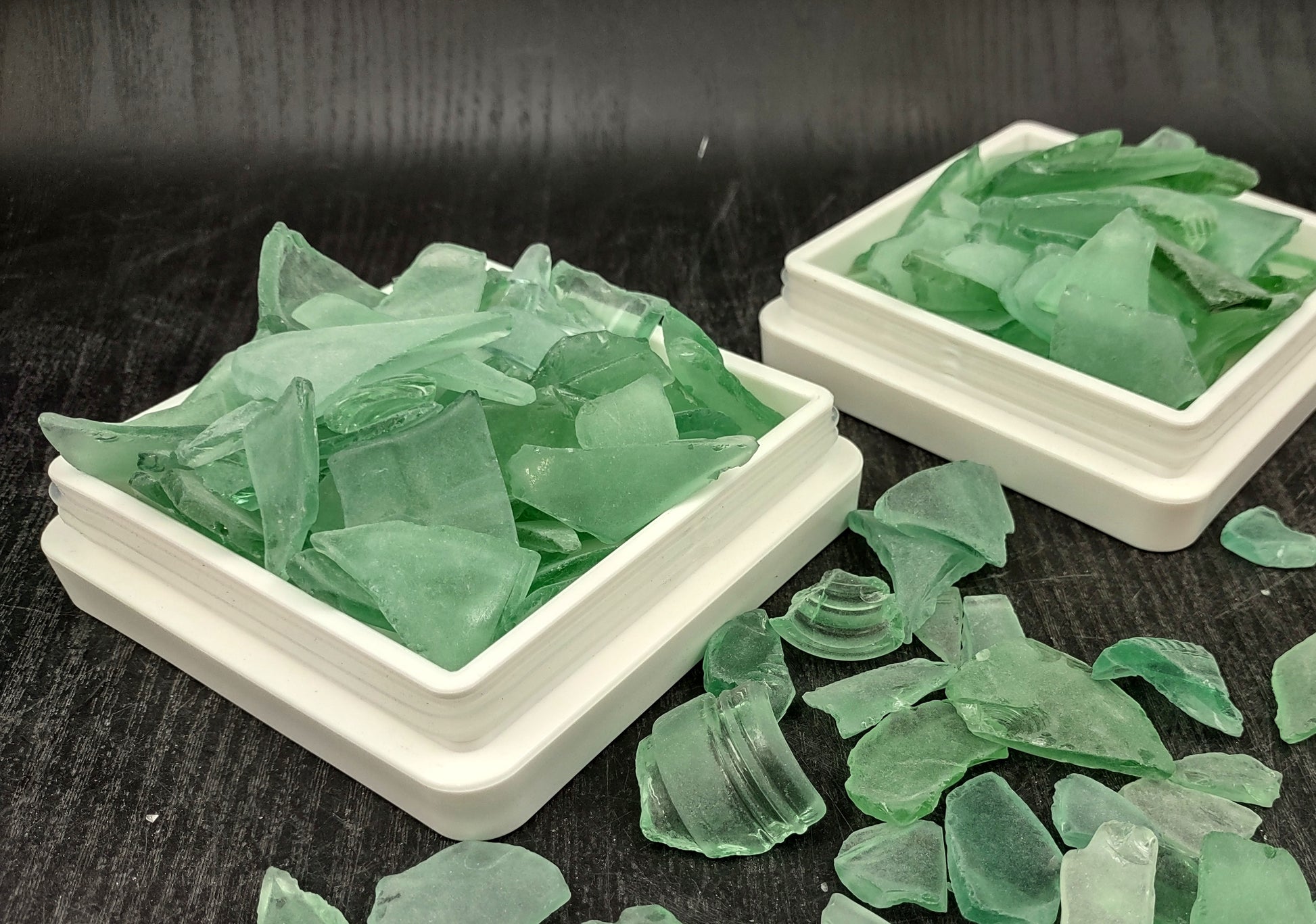 Beach Glass - Medium Tumbled Rough Coke Bottle Green - (approx. 1 Kilogram/2.2 lbs. .5-1.25 inches). Multiple green glass pieces in different shapes. Copyright 2024 SeaShellSupply.com.
