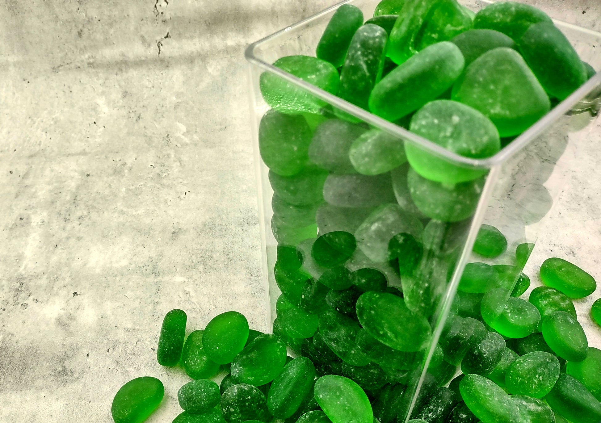 Beach Sea Glass Rounded Green Frosted Tumbled Pebbles (approx. 10 lbs. 1-1.5 inch). Green Beach Glass pebbles. Copyright 2022 SeaShellSupply.com.