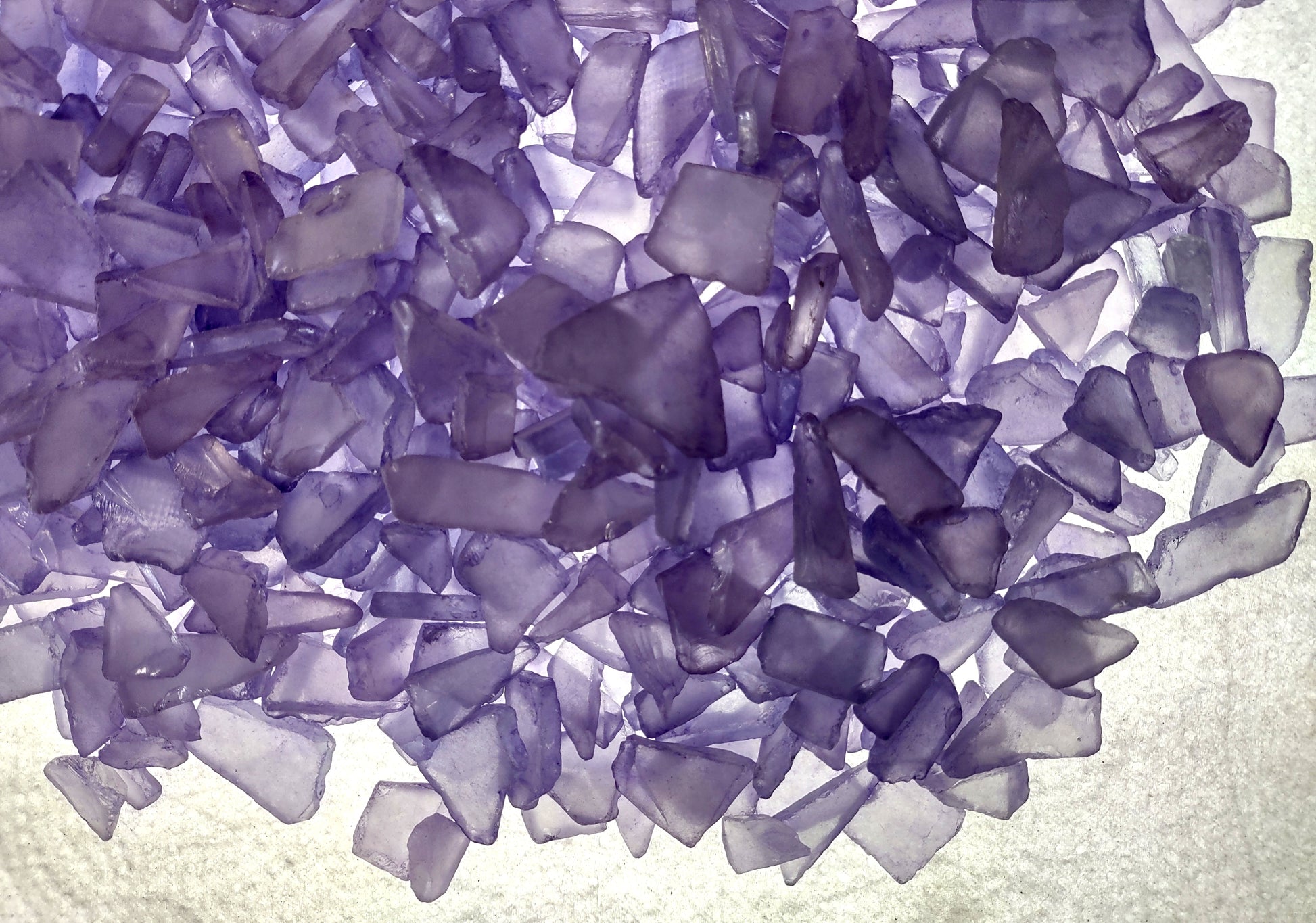 Beach Sea Glass Rough Light Lavender Medium Tumbled (approx. 1 kilogram 0.5-1+ inches) Man made sea glass fragments. Copyright 2024 Seashellsupply.com