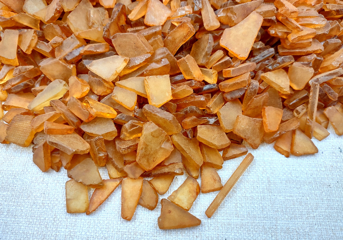 Beach Sea Glass Rough Light Brown Medium Tumbled (approx. 10 pounds 0.5-1+ inches) Man made tumbled rough sea glass fragments! Brown orange small pieced sea glass. Copyright 2024 SeaShellMart.com