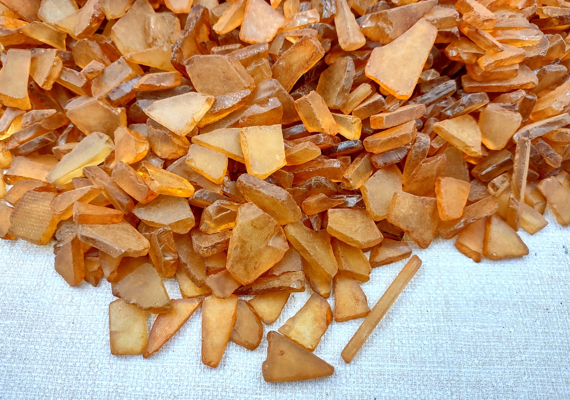 Beach Sea Glass Rough Light Brown Medium Tumbled (approx. 10 pounds 0.5-1+ inches) Man made tumbled rough sea glass fragments! Brown orange small pieced sea glass. Copyright 2024 SeaShellMart.com