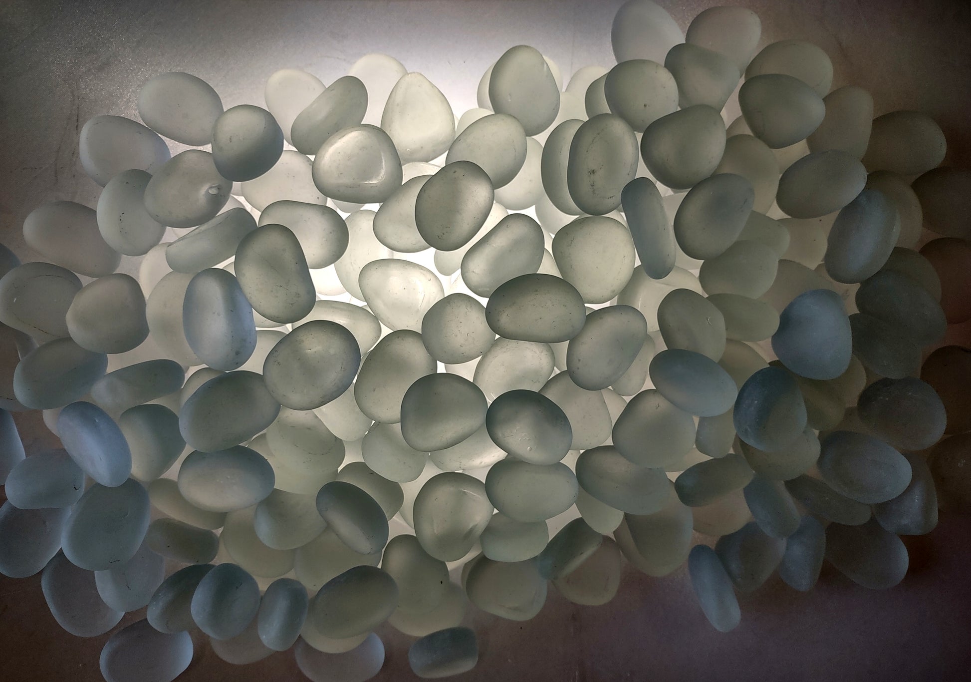 Beach Sea Glass Rounded White Frosted Tumbled Pebbles (approx. 10 pounds 1+ inch) Copyright 2024 SeashellSupply.com