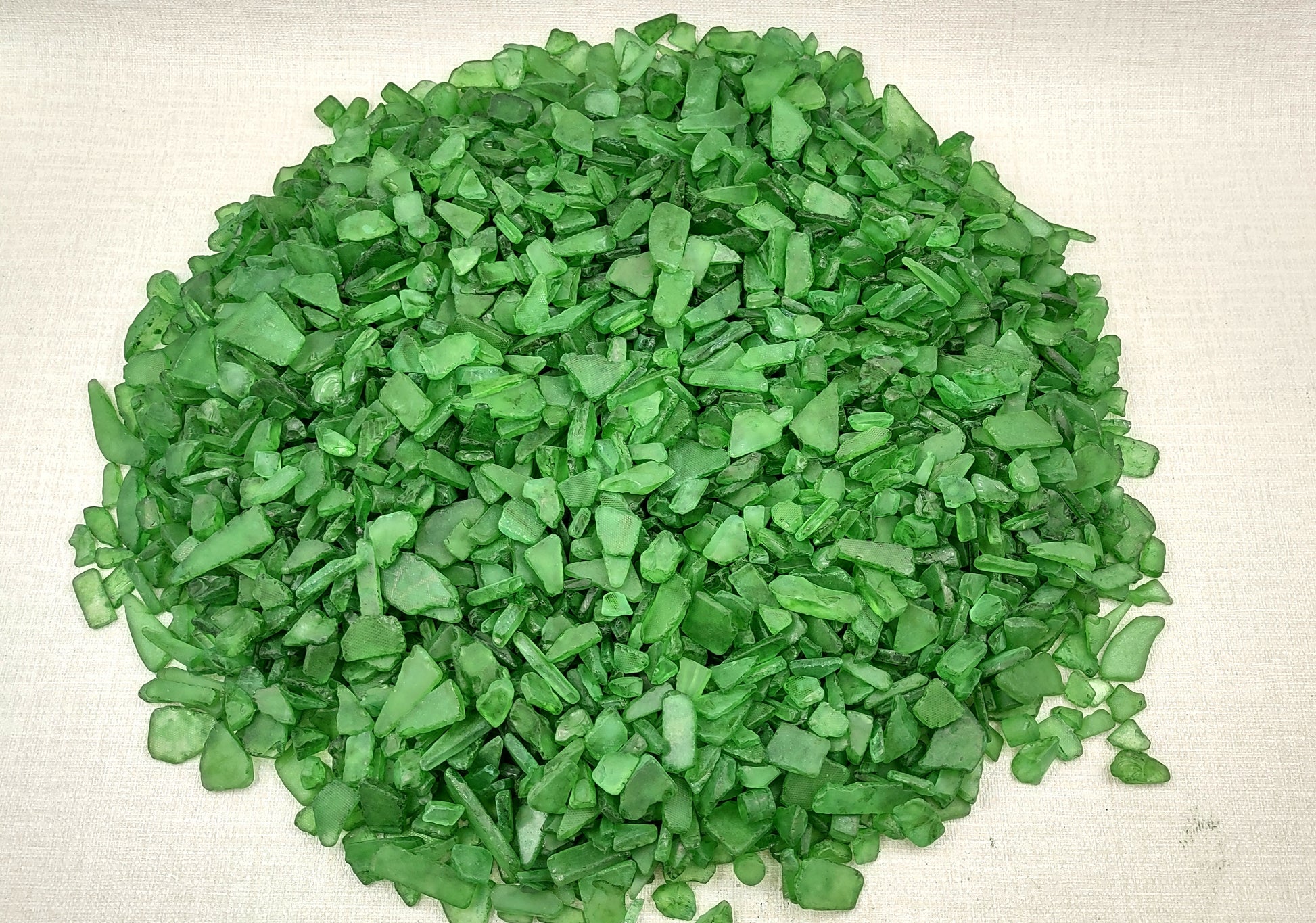 Beach Sea Glass Rough Dark Green Medium (approx. 10 pounds 0.5-1+ inches) Man made tumbled rough sea glass fragments. Copyright 2024 Seashellsupply.com