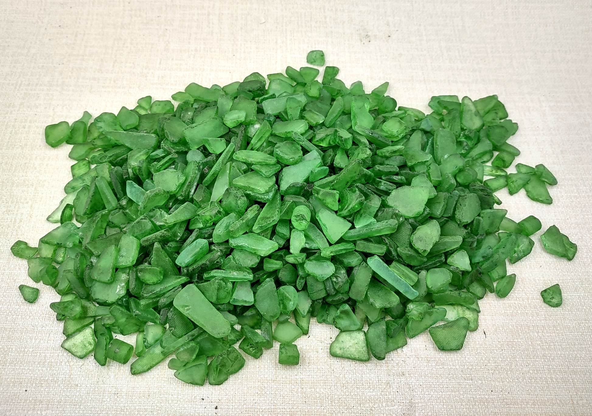 Beach Sea Glass Rough Dark Green Medium Tumbled (approx. 1 kilogram 0.5-1+ inches) Man made frosted sea glass fragments Copyright 2024 seashellsupply.com