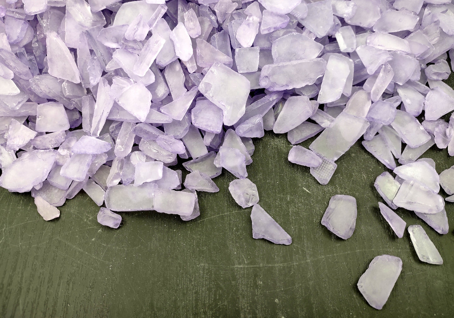 Beach Sea Glass Rough Lavender Medium (approx. 10 pounds 0.5-1+ inches) Man made tumbled rough sea glass fragments. Copyright 2024 Seashellsupply.com