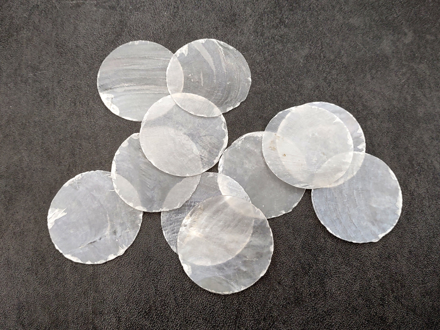 Capiz Round Cut Shells Placuna Placenta (10 approx. 1.5+ inches) Perfect shells for coastal crafting décor & collections! white translucent round thin sheets. Copyright 2024 SeaShellSupply.com