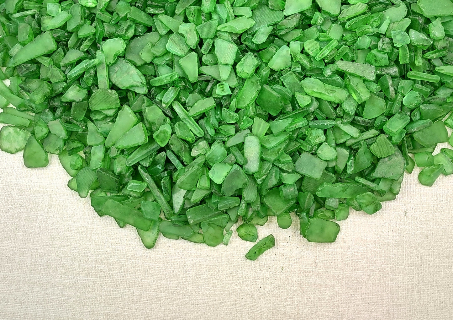 Beach Sea Glass Rough Dark Green Medium (approx. 10 pounds 0.5-1+ inches) Man made tumbled rough sea glass fragments. Copyright 2024 Seashellsupply.com
