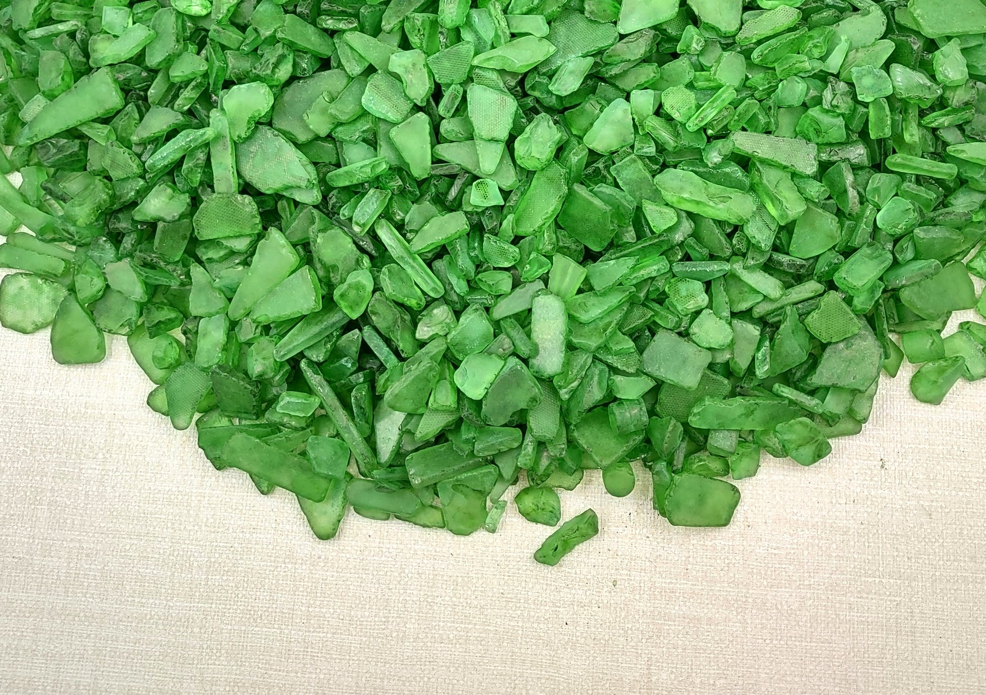 Beach Sea Glass Rough Dark Green Medium (approx. 10 pounds 0.5-1+ inches) Man made tumbled rough sea glass fragments. Copyright 2024 Seashellsupply.com