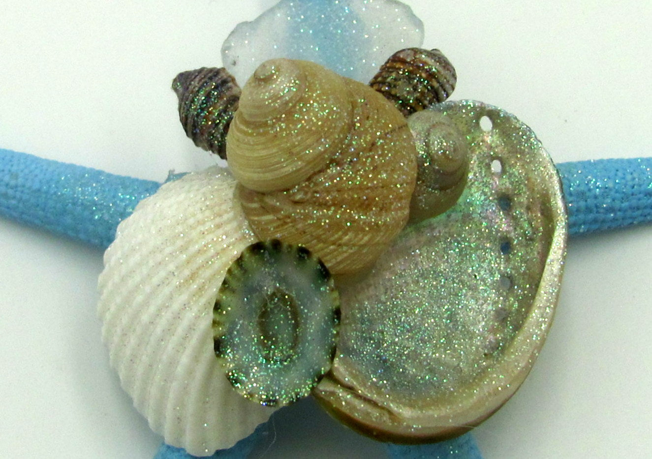 Frosted Seaglass Blue Starfish Ornament (1 star approx. 4-6 inches) on white background. Copyright 2022 SeaShellSupply.com.