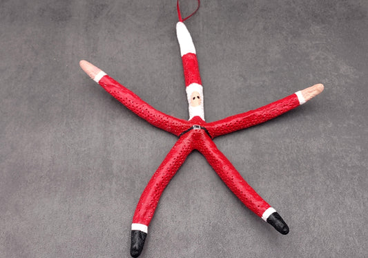 Red Linckia Starfish Santa Claus Ornament (1 seastar approx. 10-12 inches) Painted Santa Claus Starfish Ornament For Coastal Beach Christmas. Copyright 2023 SeaShellSupply.com.