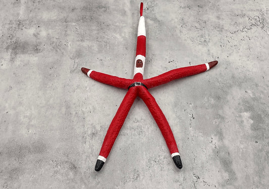 Red Linckia Starfish Black Santa Claus Ornament (1 star approx. 10-11+ inches) Painted Black Santa Claus Starfish Ornament For Christmas  Copyright 2023 SeaShellSupply.com.